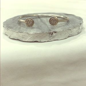 Super cute stackable pandora signature cuff.